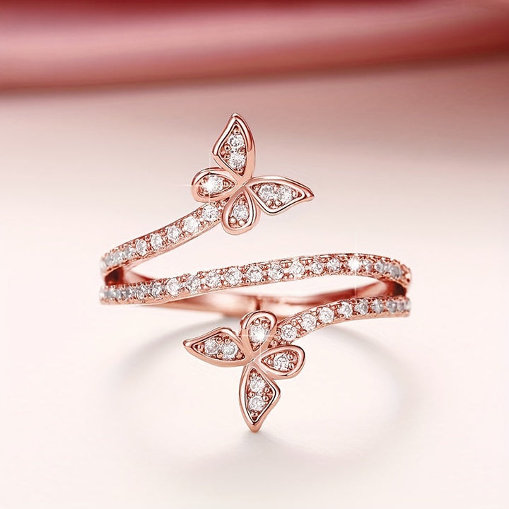 Ring with Butterflies and Set Zircon Stones in White Gold