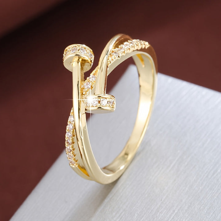 Crossed white gold ring with cubic zirconia
