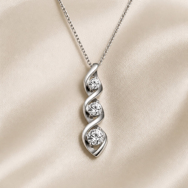 White gold necklace with infinity-shaped pendant and cubic zirconia
