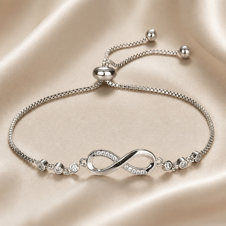 White gold slider bracelet with infinity symbol