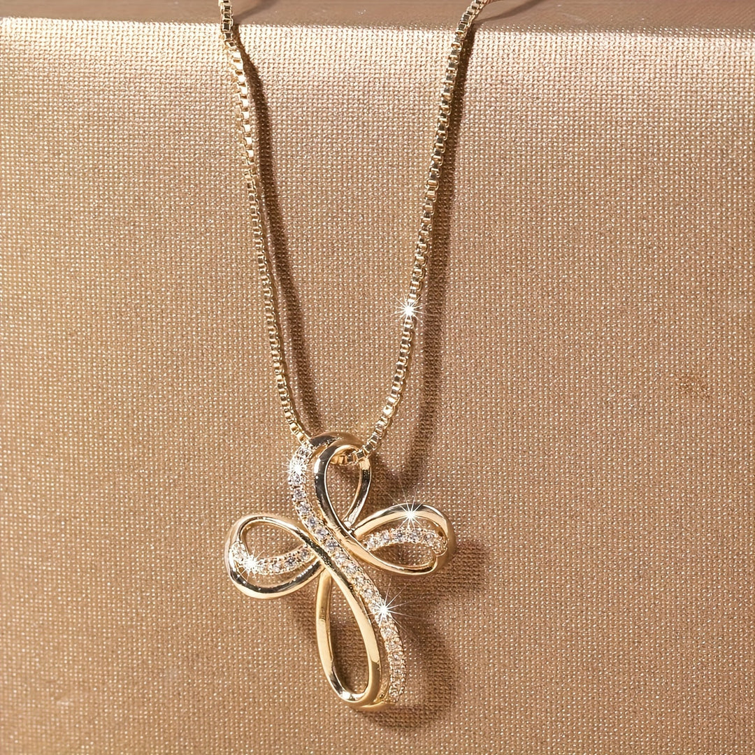 White gold necklace with intertwined cross pendant