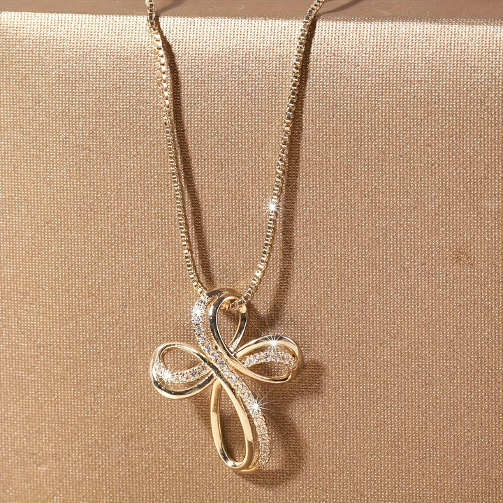 White gold necklace with intertwined cross pendant
