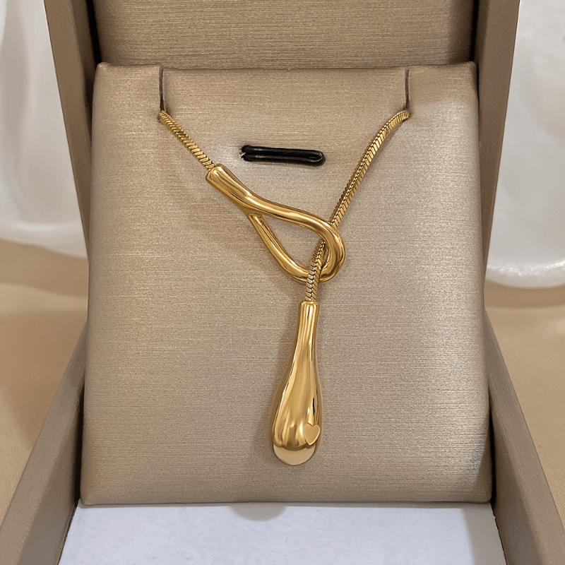 Vintage white gold necklace with teardrop pendant