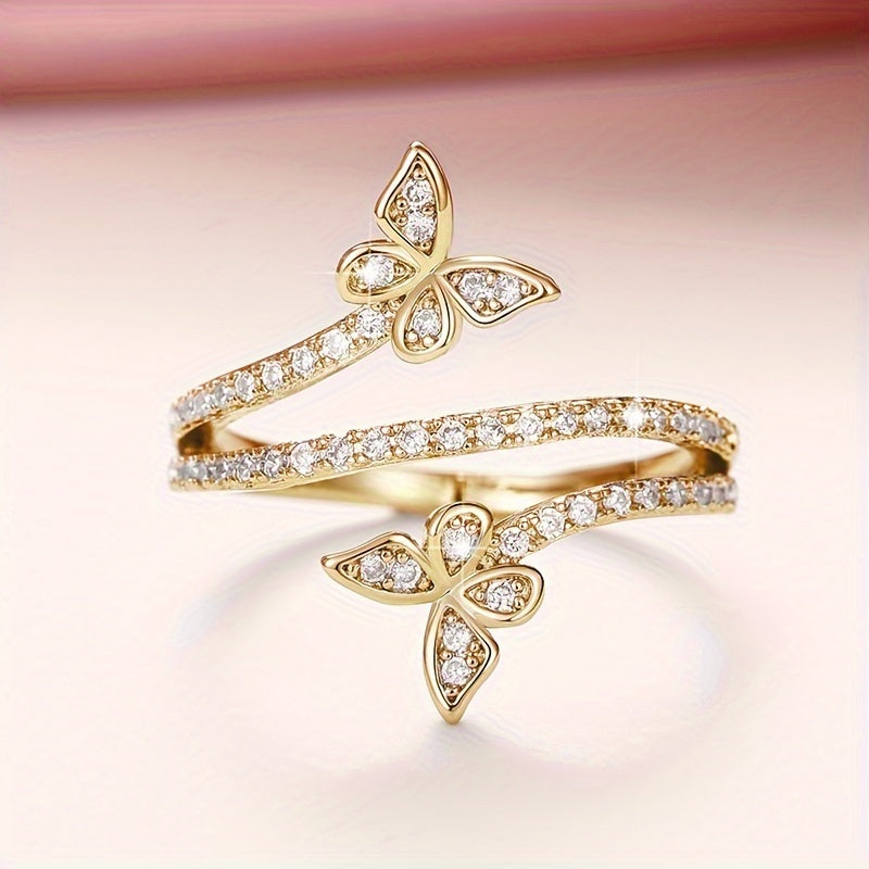Ring with Butterflies and Set Zircon Stones in White Gold