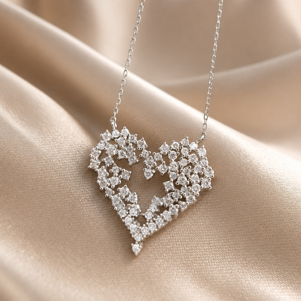 White gold necklace with a zirconia heart pendant