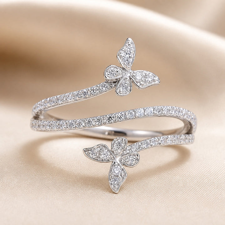 Ring with Butterflies and Set Zircon Stones in White Gold