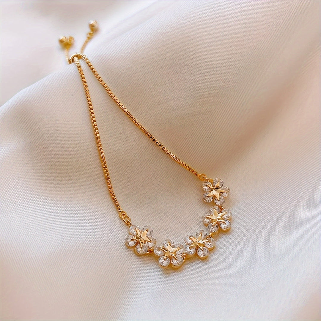 White Gold Bracelet with Flower-Shaped Cubic Zirconia