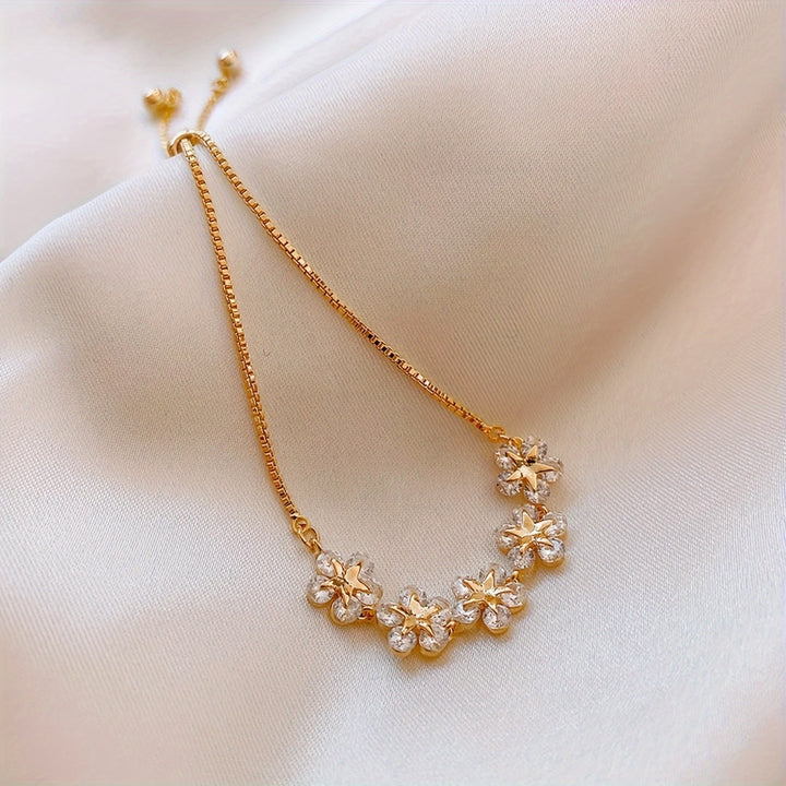 White Gold Bracelet with Flower-Shaped Cubic Zirconia
