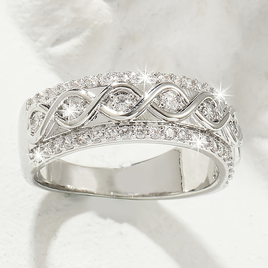 White gold ring with a double row of cubic zirconia gemstones