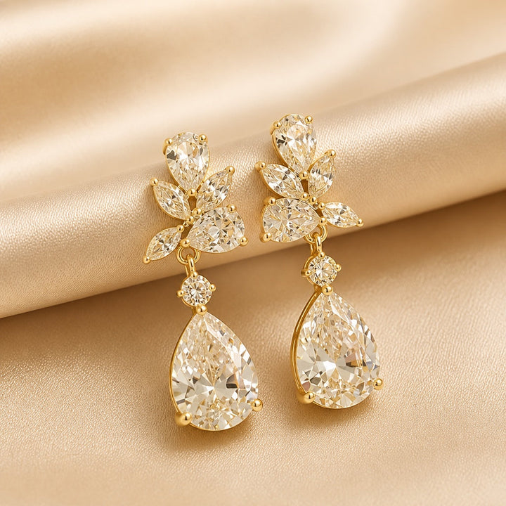 Drop earrings with flowers in white gold