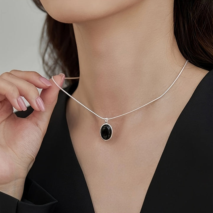 Elegant oval white gold necklace